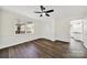 Spacious bedroom with hardwood floors and access to bathroom at 2988 Great Falls Hwy, Lancaster, SC 29720