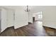 Bright dining room, hardwood floors, and view into living room with fireplace at 2988 Great Falls Hwy, Lancaster, SC 29720