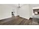 Bright dining room with hardwood floors and chandelier, open to kitchen at 2988 Great Falls Hwy, Lancaster, SC 29720