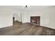 Living room with fireplace and view into dining room at 2988 Great Falls Hwy, Lancaster, SC 29720