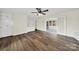 Spacious living room with hardwood floors, built-in shelves, and sunroom access at 2988 Great Falls Hwy, Lancaster, SC 29720