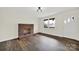 Living room with brick fireplace and hardwood floors at 2988 Great Falls Hwy, Lancaster, SC 29720