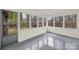 Sunroom with wood floors and multiple windows offering natural light at 2988 Great Falls Hwy, Lancaster, SC 29720