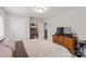 Bedroom showing a neatly made bed, a vanity table, and a large dresser with a TV at 305 Wingate Ct, Shelby, NC 28152