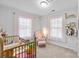 Bright Bedroom featuring natural light, a crib, and a collection of clothing at 305 Wingate Ct, Shelby, NC 28152