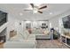 Bright, open-concept living room that flows into a modern kitchen, perfect for entertaining guests or spending time with Gathering at 305 Wingate Ct, Shelby, NC 28152