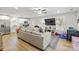 Bright, open-concept living room and kitchen area featuring modern appliances and a comfortable seating area at 305 Wingate Ct, Shelby, NC 28152