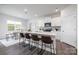 Modern kitchen with a spacious island, stainless steel appliances, sleek countertops, and stylish seating at 321 Brinkley Dr, Kings Mountain, NC 28086