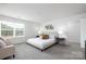 Spacious main bedroom with king-size bed and sitting area at 321 Brinkley Dr, Kings Mountain, NC 28086