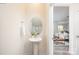 Small powder room with pedestal sink and view to living room at 321 Brinkley Dr, Kings Mountain, NC 28086