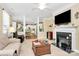 Living room with fireplace and view of kitchen at 3229 Sapphire Ln, Fort Mill, SC 29708