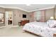 Main bedroom with ensuite bathroom and TV at 3229 Sapphire Ln, Fort Mill, SC 29708