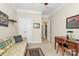 Home office with a desk, sofa, and access to a hallway at 3229 Sapphire Ln, Fort Mill, SC 29708