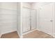 Bathroom with a large walk-in shower and shelving at 3238 Maple Ridge Dr, Gastonia, NC 28052