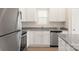 Modern kitchen with stainless steel appliances and granite countertops at 3238 Maple Ridge Dr, Gastonia, NC 28052