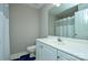 This bathroom features a white vanity, toilet and neutral finishes at 5707 Brandy Ridge Ln, Charlotte, NC 28269