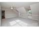 Spacious bedroom features carpet, ceiling fan, and natural light from the window at 5707 Brandy Ridge Ln, Charlotte, NC 28269