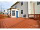 Entertain on a beautiful deck with painted blue accents to the trim at 5707 Brandy Ridge Ln, Charlotte, NC 28269