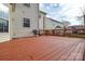 An expansive deck is stained a deep red to provide a perfect entertaining space at 5707 Brandy Ridge Ln, Charlotte, NC 28269