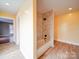 The bathroom has a combined shower and tub, and modern fixtures and finishes at 613 S Mulberry St, Statesville, NC 28677