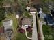 Stunning aerial view showcasing the home's unique dome design, landscaping, and spacious driveway at 7977 Lucky Creek Ln, Denver, NC 28037
