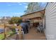 Enjoyable deck area with comfortable outdoor seating and a lake view at 7977 Lucky Creek Ln, Denver, NC 28037