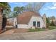 Unique dome home with a circular roof and manicured landscaping at 7977 Lucky Creek Ln, Denver, NC 28037