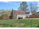 Detached two-car garage with an upper level, offering extra storage space and parking at 7977 Lucky Creek Ln, Denver, NC 28037