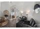 Cozy living area with a stone fireplace, and an open layout at 7977 Lucky Creek Ln, Denver, NC 28037
