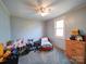 Bedroom featuring twin bed, dresser, and motorcycle parked inside at 1075 Fye Dr, Newton, NC 28658