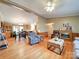 Inviting living room with hardwood floors connecting to the dining area at 1075 Fye Dr, Newton, NC 28658