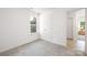 Well-lit bedroom offers plush carpeting, natural light and a closet at 1124 Thayer Glen Ct, Charlotte, NC 28213