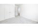 Clean and bright bedroom with carpeted floors, closet and door at 1124 Thayer Glen Ct, Charlotte, NC 28213