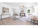 Bright living room with neutral tones, stylish decor, modern furniture, and lots of natural light at 1124 Thayer Glen Ct, Charlotte, NC 28213