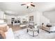 Open-concept living room flowing into the kitchen and dining area, perfect for modern living and entertaining at 1124 Thayer Glen Ct, Charlotte, NC 28213