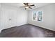Spacious bedroom with hardwood floors and ceiling fan at 11430 Gelding Dr, Charlotte, NC 28215