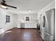 Bright kitchen with stainless steel appliances and hardwood floors at 11430 Gelding Dr, Charlotte, NC 28215