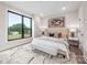 The large bedroom offers a bright space, a modern rug, and an outside view at 115 Verbena Ne St # 12, Charlotte, NC 28217