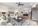 This open concept living room flows to the dining area and staircase with modern finishes at 115 Verbena Ne St # 12, Charlotte, NC 28217