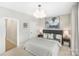 Serene bedroom showcasing a cozy bed, stylish lamps, and a minimalist design at 115 Verbena Ne St # 12, Charlotte, NC 28217