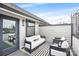 Stylish rooftop deck featuring outdoor seating and ambient string lights at 115 Verbena Ne St # 12, Charlotte, NC 28217