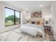 Bright bedroom featuring a large window, neutral tones, and stylish decor, perfect for relaxation at 115 Verbena Ne St, Charlotte, NC 28217