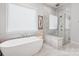 Elegant bathroom with soaking tub and walk-in shower at 13109 Brooklyn Skylar Way, Huntersville, NC 28078