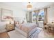 Light and airy bedroom with a neutral color scheme at 13109 Brooklyn Skylar Way, Huntersville, NC 28078