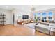 Spacious bonus room with sectional sofa and large TV at 13109 Brooklyn Skylar Way, Huntersville, NC 28078