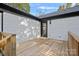 Wooden deck overlooking backyard with privacy fence at 1600 Academy St, Charlotte, NC 28205