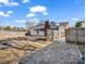 Large backyard with a wooden fence at 201 Ware St, Shelby, NC 28150