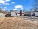 Large backyard with a wooden fence at 201 Ware St, Shelby, NC 28150