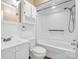White bathroom with shower/tub, toilet and white vanity at 201 Ware St, Shelby, NC 28150