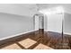 Bedroom with hardwood floors, ceiling fan, and double doors at 201 Ware St, Shelby, NC 28150